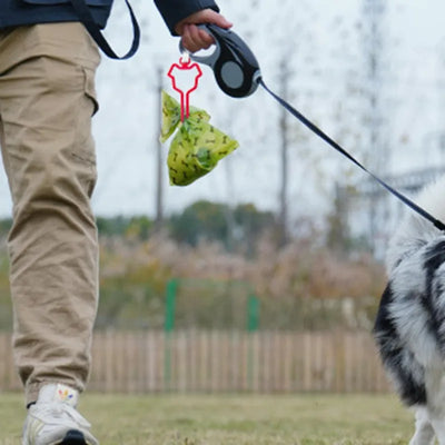 Porte-sac à crottes de chien mains libres avec clip de transport pour déchets d'animaux de compagnie